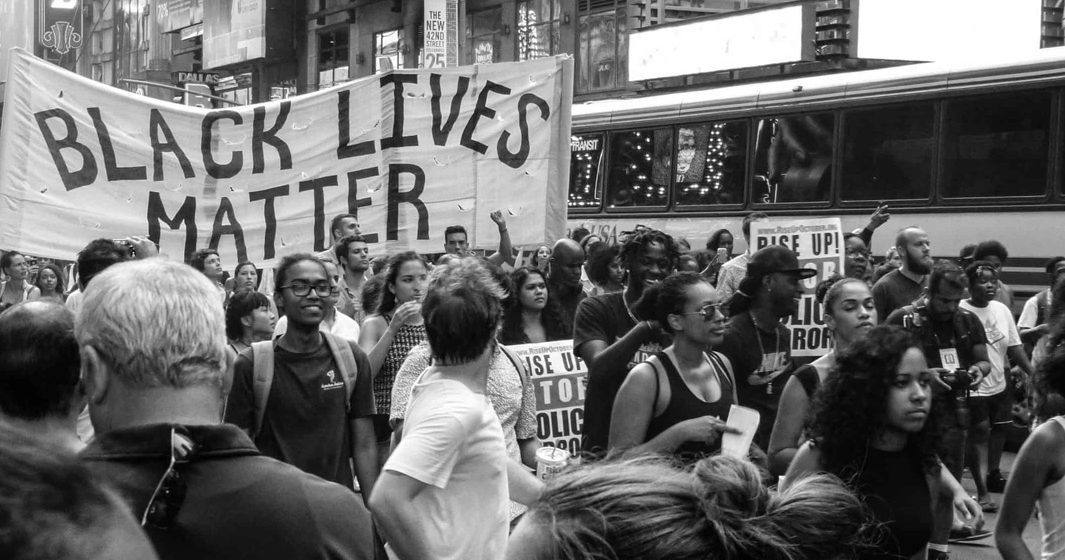 People protesting on a street as part of "Black Lives Matter"